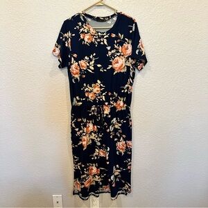 Soft navy dress with flowers and a tie at the waist